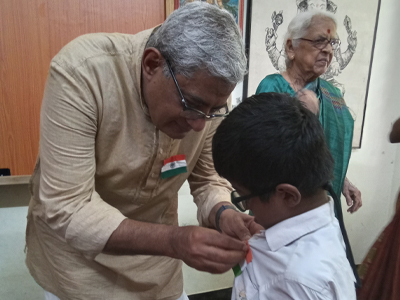 Mr. Bharath pins the flag (Independance Day)